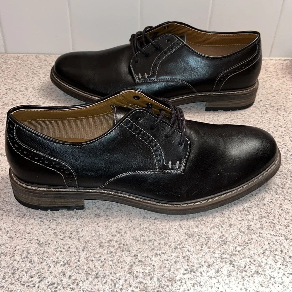 Brand New Never worn Men Dress shoes. Black with black laces.